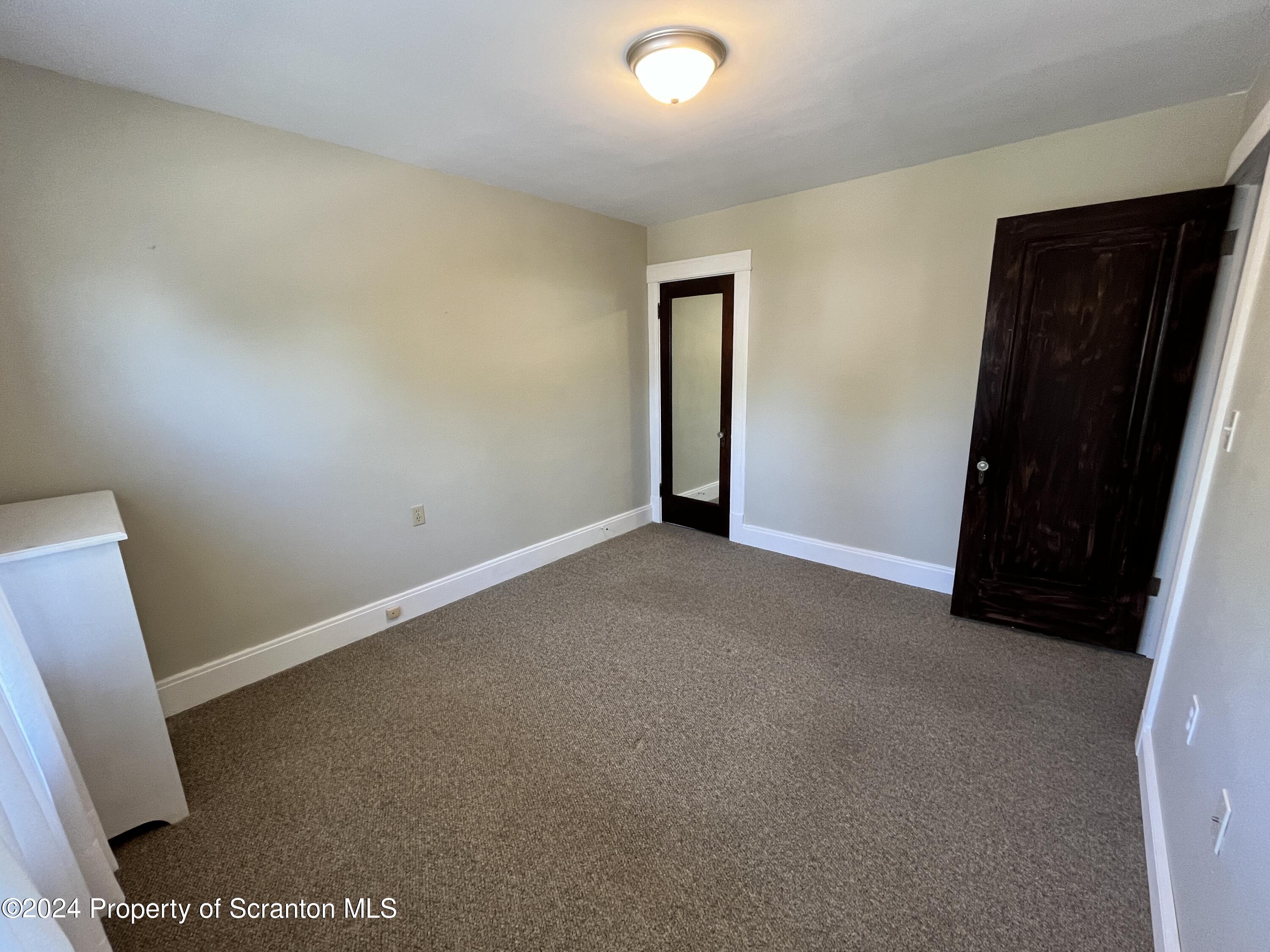 2002 Green Ridge Street Dunmore, PA 18512 - Photo 18 of 43 an empty room with closet