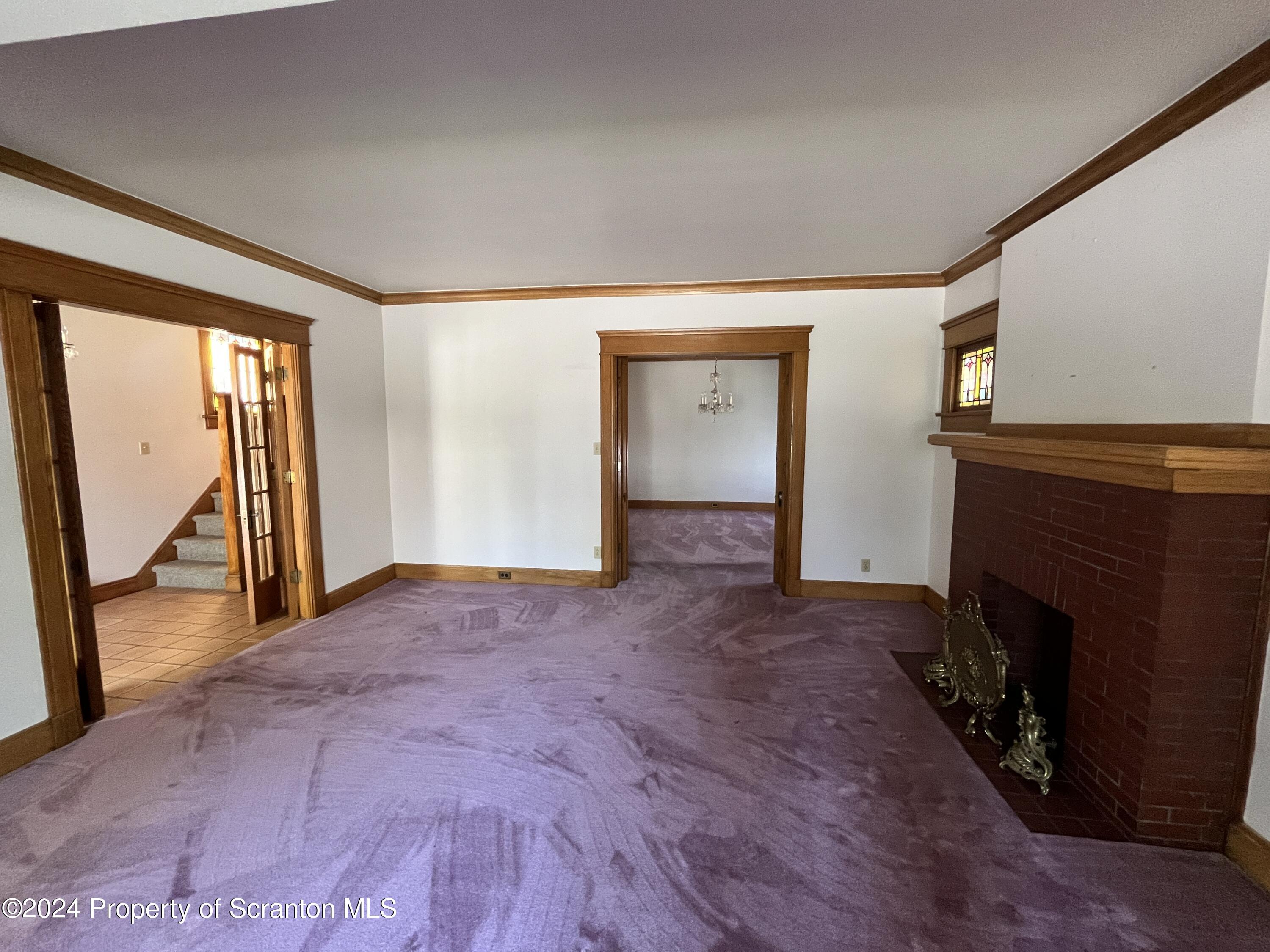 2002 Green Ridge Street Dunmore, PA 18512 - Photo 9 of 43 a view of empty room with floor to ceiling window