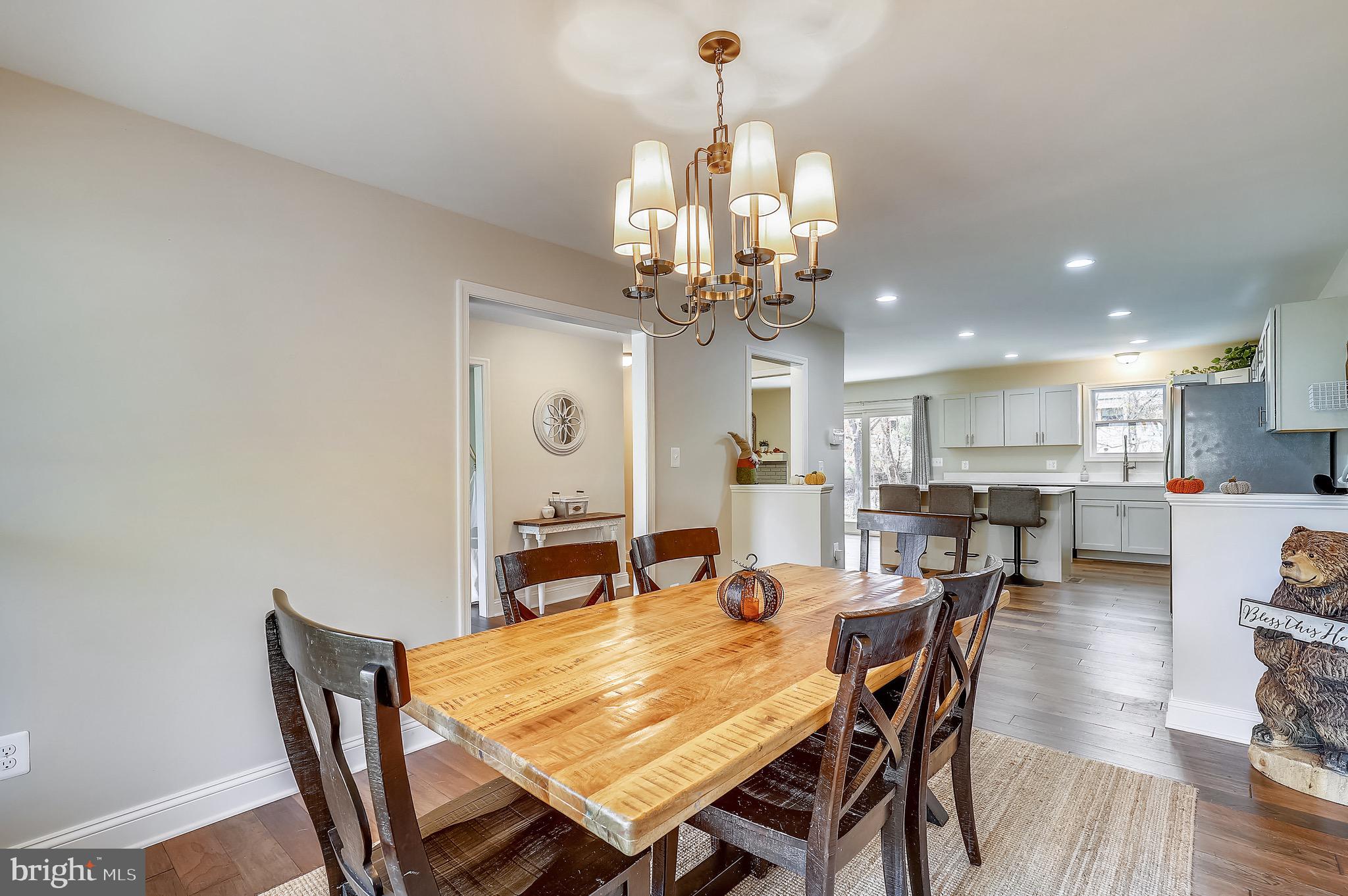 9426 Boyds Turn Road Owings, MD 20736 - Photo 8 of 27 a view of a dining room with furniture and wooden floor