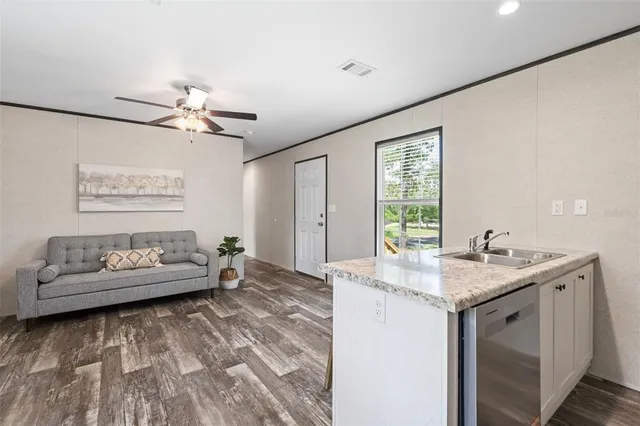 a living room with furniture and a table