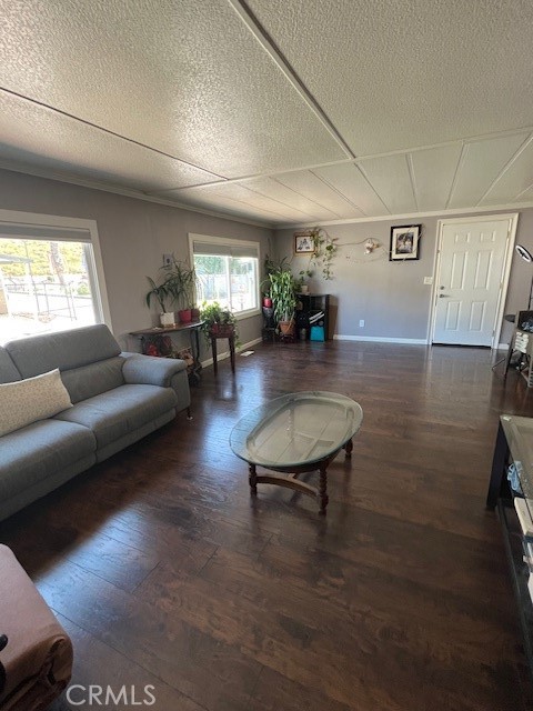 4901 Green River Road, Unit 104 Corona, CA 92878 - Photo 12 of 59 a living room with furniture and a window