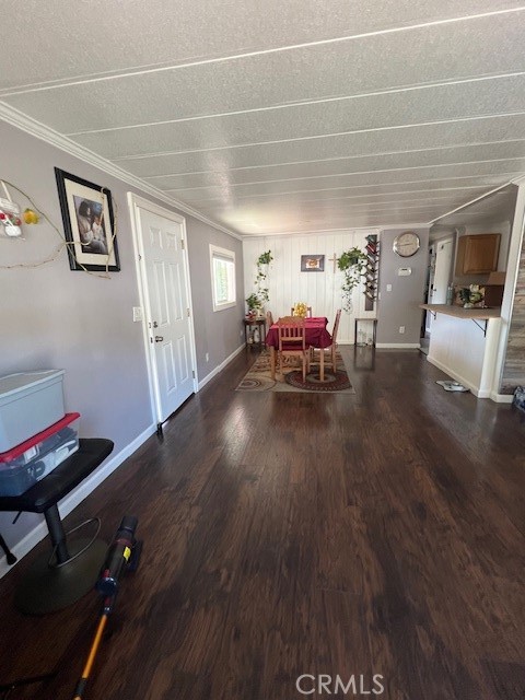 4901 Green River Road, Unit 104 Corona, CA 92878 - Photo 13 of 59 a dining room with furniture and wooden floor