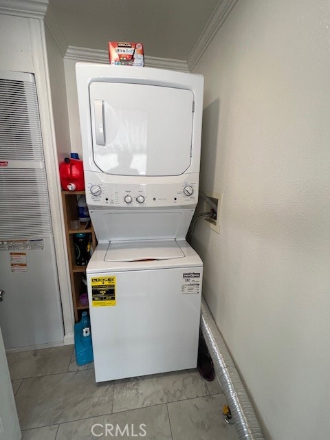 4901 Green River Road, Unit 104 Corona, CA 92878 - Photo 18 of 59 a utility room with dryer and washer