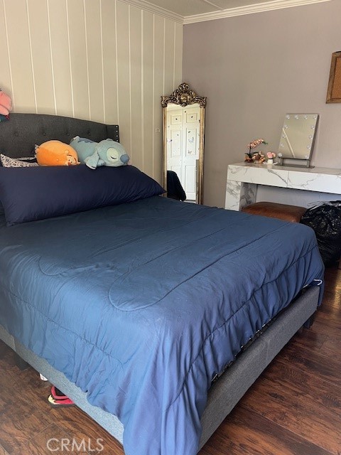 4901 Green River Road, Unit 104 Corona, CA 92878 - Photo 21 of 59 a bedroom with a bed and a night stand