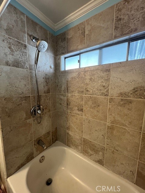 4901 Green River Road, Unit 104 Corona, CA 92878 - Photo 24 of 59 a bathroom with a white bath tub and a shower