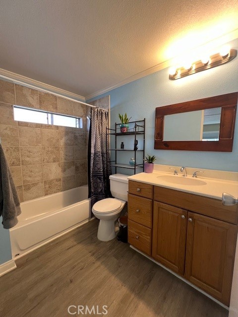 4901 Green River Road, Unit 104 Corona, CA 92878 - Photo 32 of 59 a bathroom with a bathtub shower sink mirror and toilet