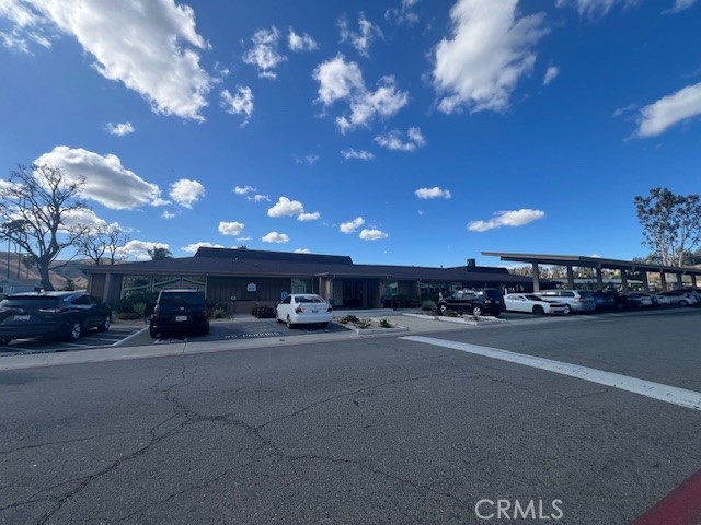 4901 Green River Road, Unit 104 Corona, CA 92878 - Photo 44 of 59 a view of a parking space in front of a building