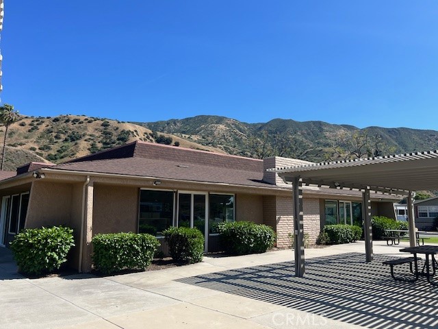4901 Green River Road, Unit 104 Corona, CA 92878 - Photo 55 of 59 front view of a house with a yard