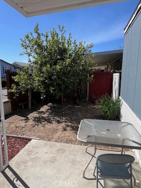 4901 Green River Road, Unit 104 Corona, CA 92878 - Photo 8 of 59 a view of a backyard with furniture