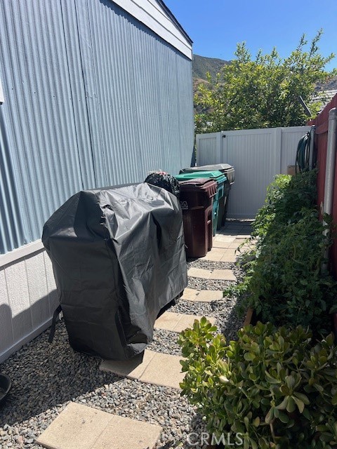 4901 Green River Road, Unit 104 Corona, CA 92878 - Photo 10 of 59 a view of a backyard with sitting area