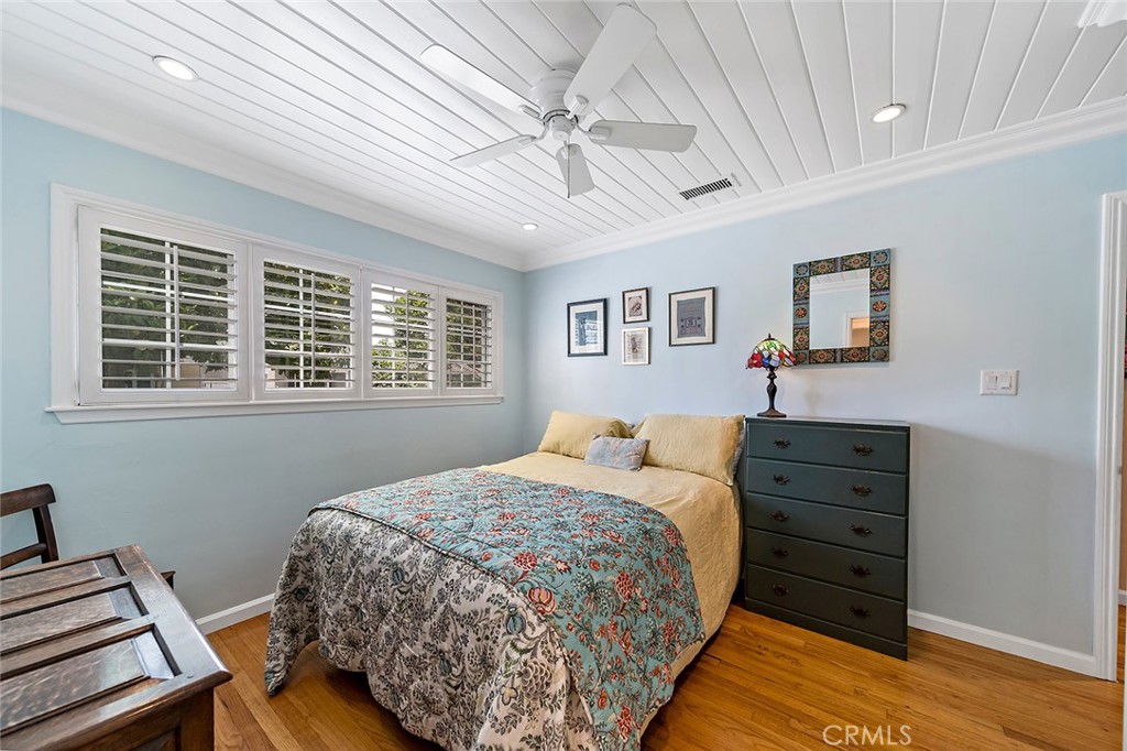 3432 Roxanne Avenue Long Beach, CA 90808 - Photo 14 of 41 a bedroom with a bed and a window