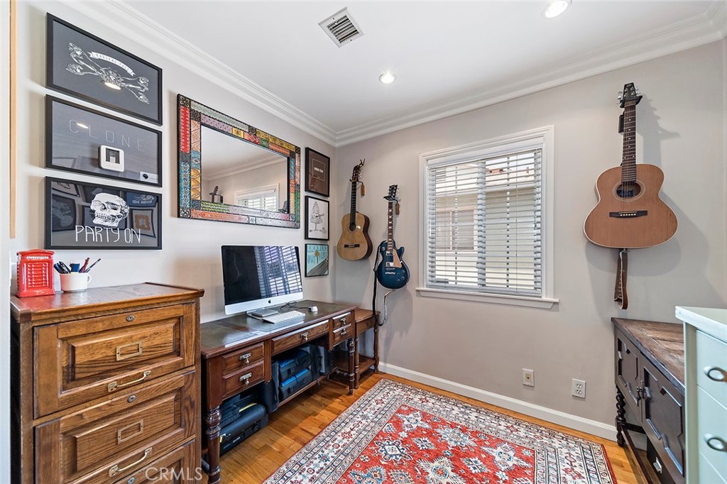 3432 Roxanne Avenue Long Beach, CA 90808 - Photo 18 of 41 a view of an empty room with furniture and a window