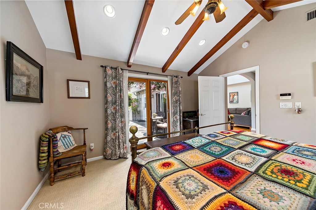 3432 Roxanne Avenue Long Beach, CA 90808 - Photo 20 of 41 a bed room with a bed and a table