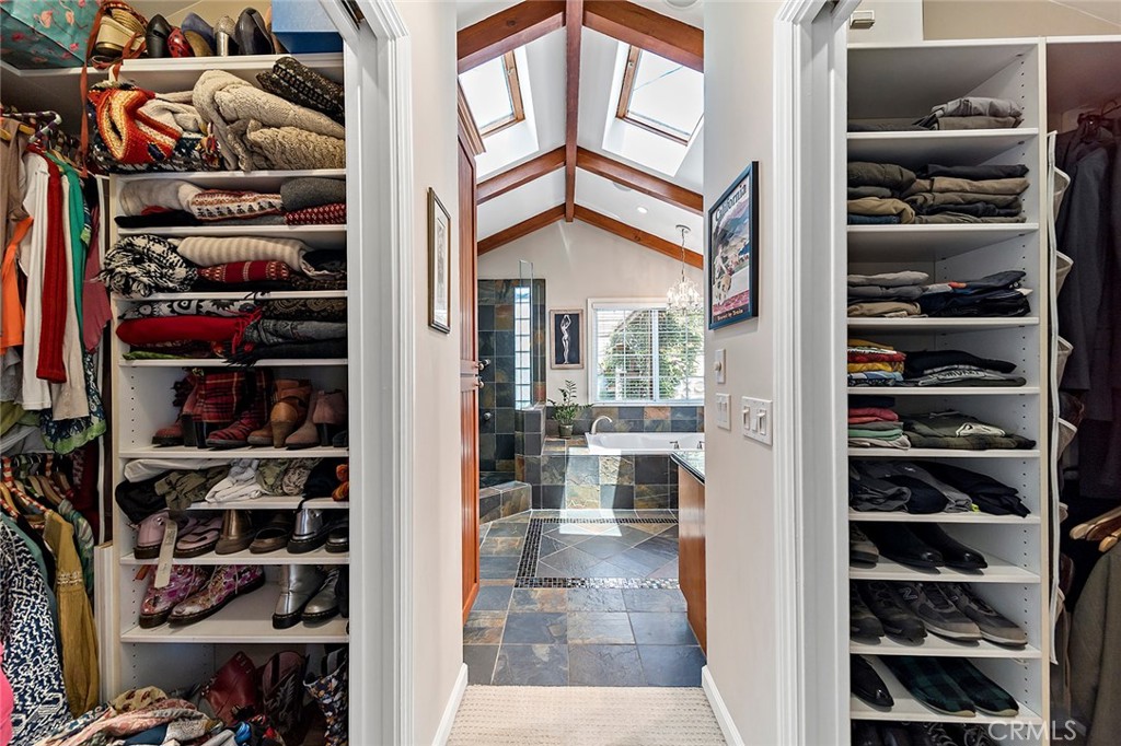 3432 Roxanne Avenue Long Beach, CA 90808 - Photo 21 of 41 a view of walk in closet with clothes and shoes