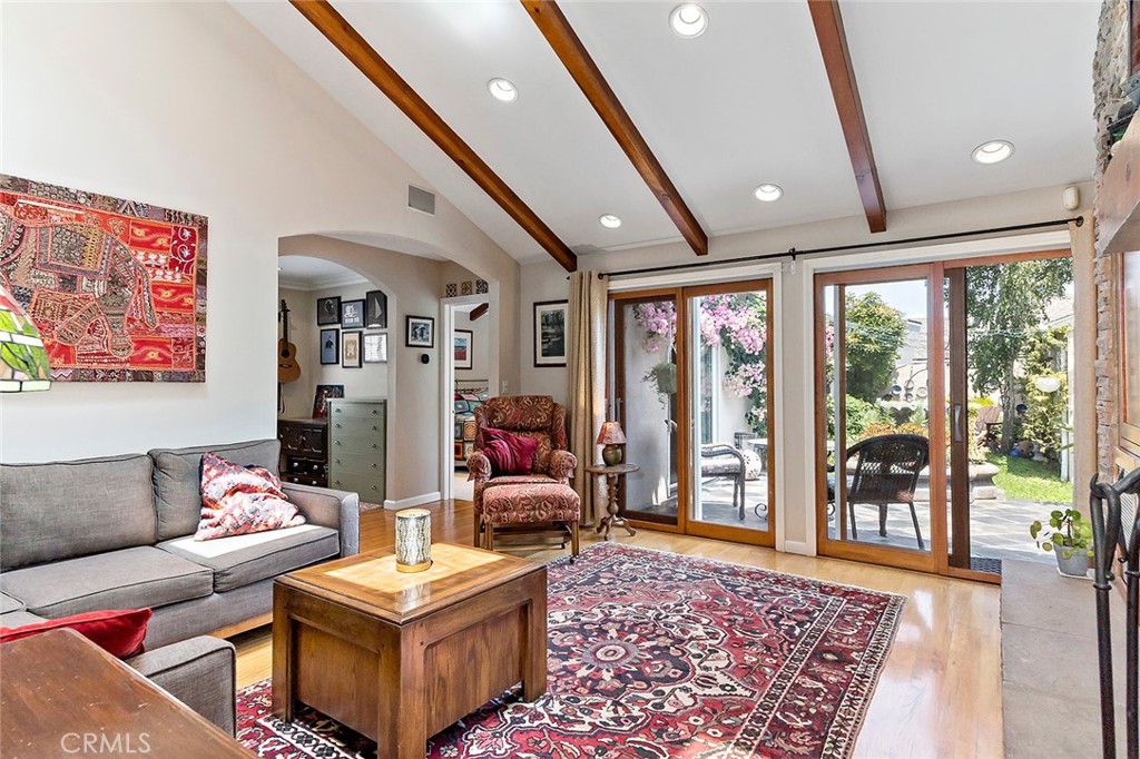 3432 Roxanne Avenue Long Beach, CA 90808 - Photo 3 of 41 a living room with furniture and a rug