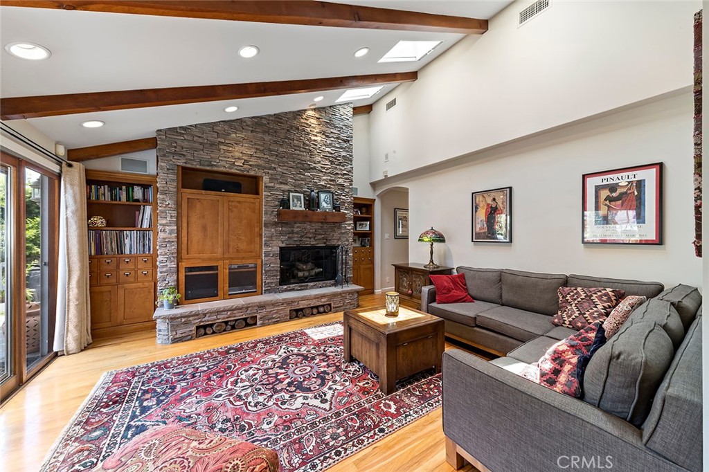 3432 Roxanne Avenue Long Beach, CA 90808 - Photo 5 of 41 a living room with furniture and a rug