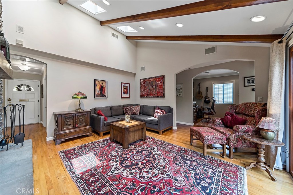 3432 Roxanne Avenue Long Beach, CA 90808 - Photo 6 of 41 a living room with furniture and a wooden floor
