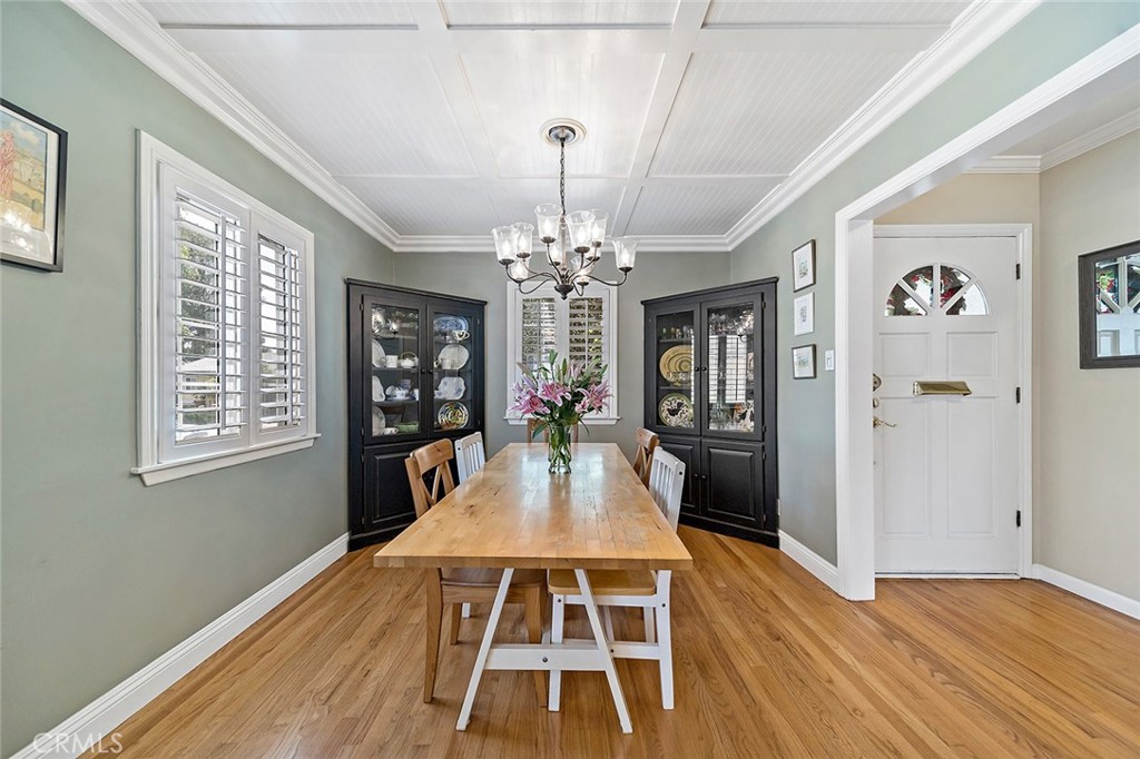 3432 Roxanne Avenue Long Beach, CA 90808 - Photo 10 of 41 a view of a living room with furniture and a chandelier