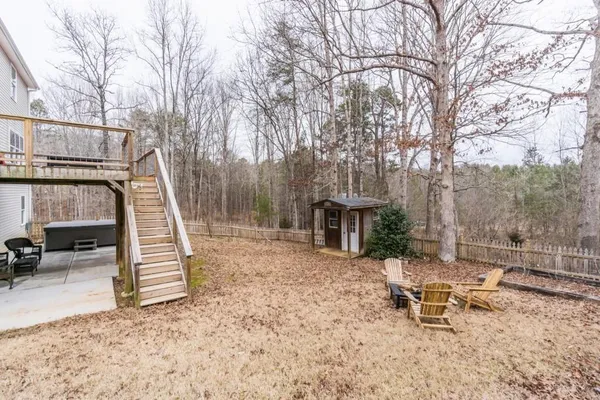 a view of a bench in a backyard