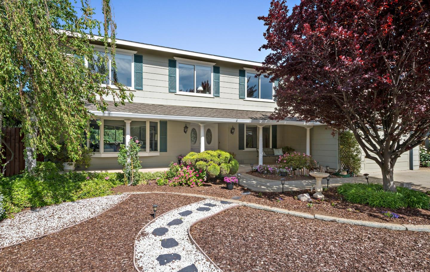 7126 Brooktree Way San Jose, CA 95120 - Photo 2 of 15 a front view of a house with garden
