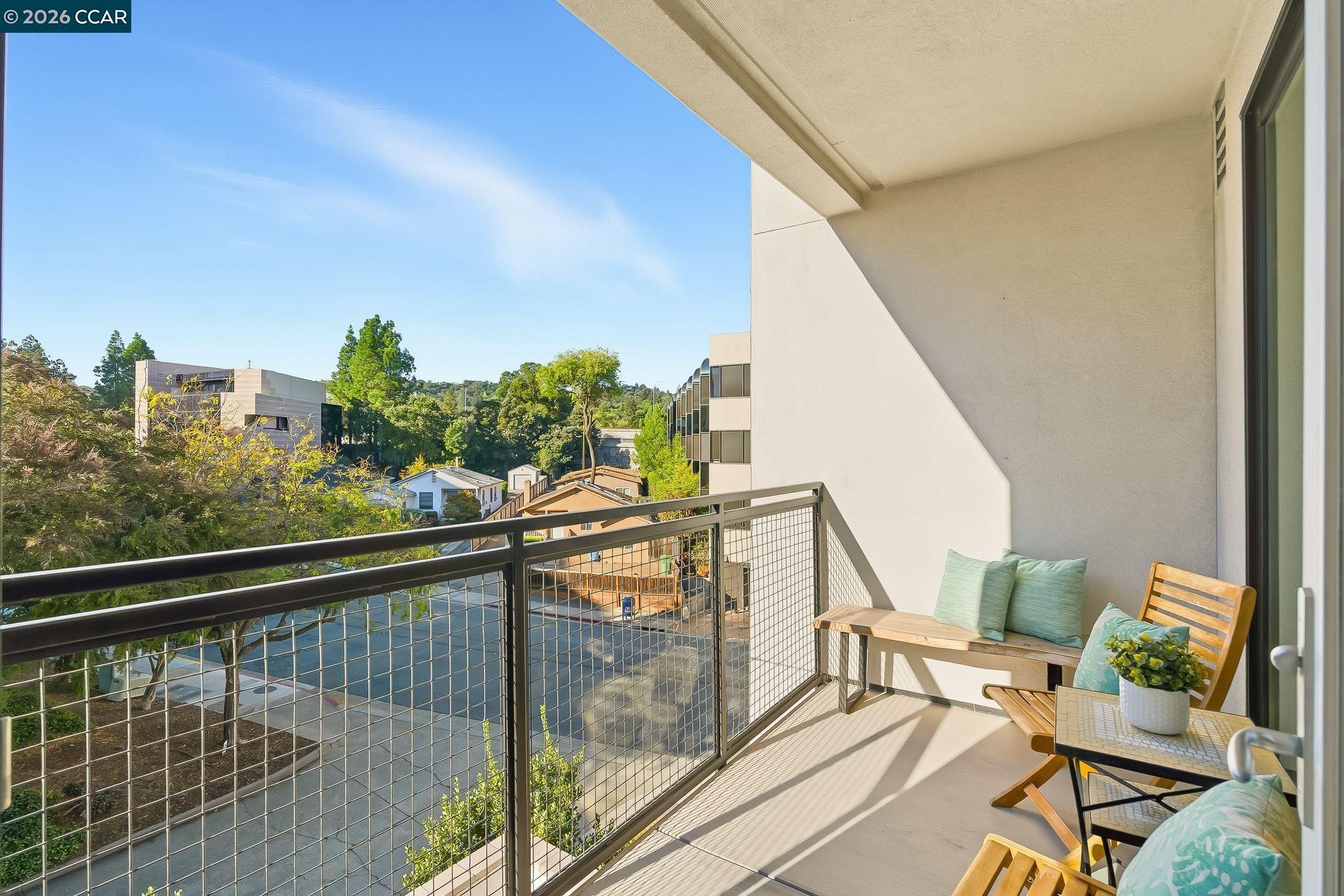1605 Riviera Avenue, Unit 404 Walnut Creek, CA 94596 - Photo 15 of 45 a view of a balcony with furniture