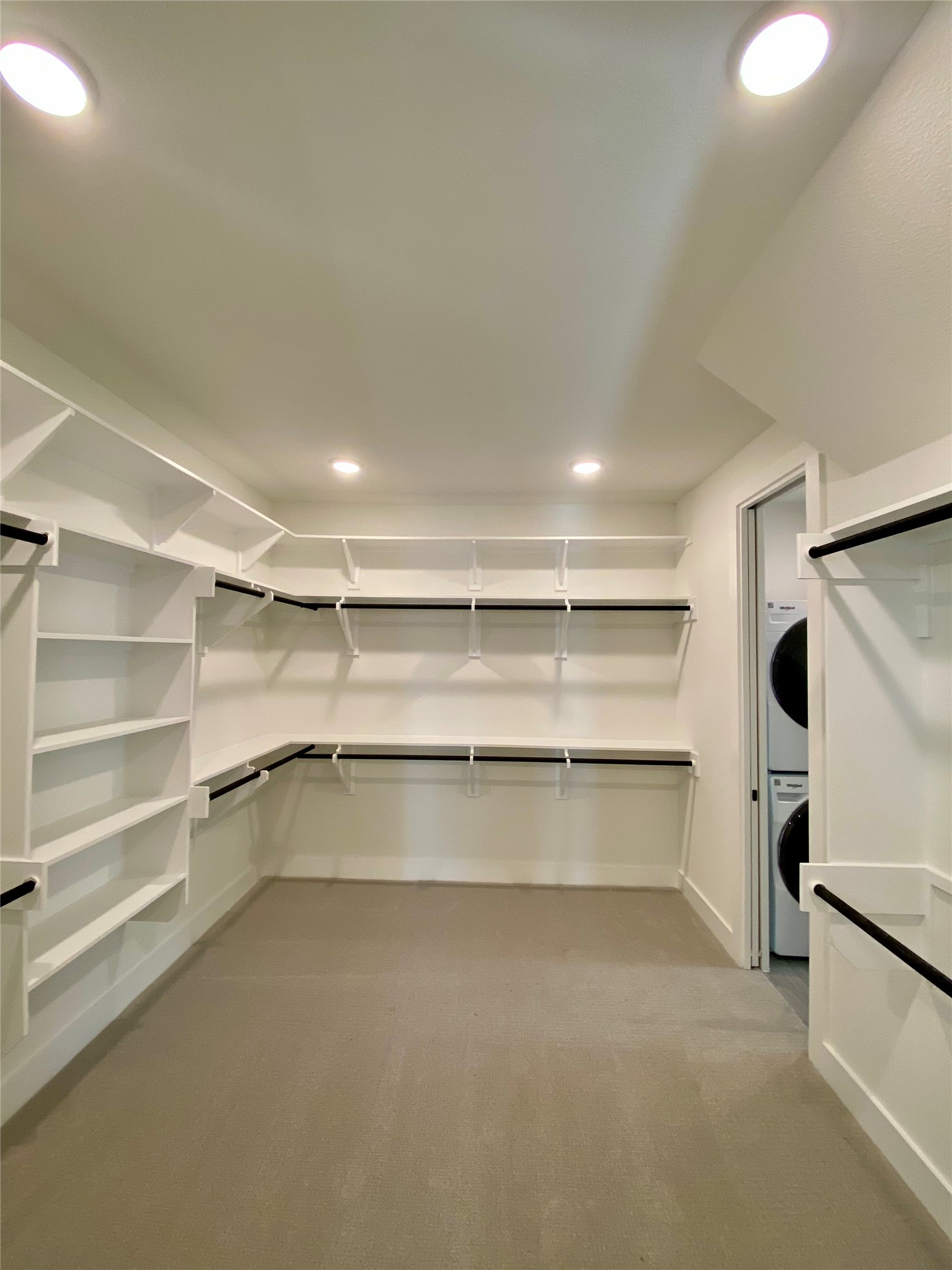17341 Graces Path Pflugerville, TX 78660 - Photo 9 of 13 a storage room with washer and dryer