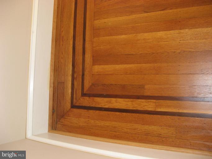 2811 Pinewood Avenue Baltimore, MD 21214 - Photo 21 of 23 Beautiful oak hardwood floors with walnut inlaid