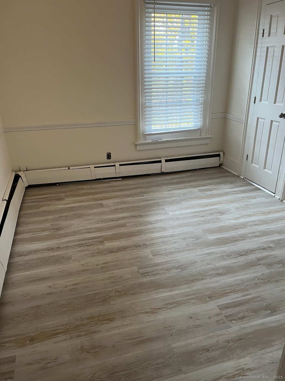 568 Danbury Road New Milford, CT 06776 - Photo 3 of 6 a view of a room with wooden floor and window