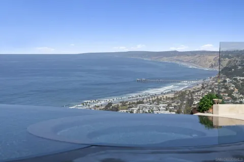 a view of a living room with furniture