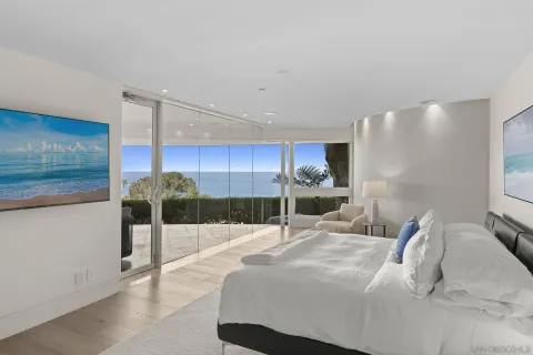 a living room with furniture fireplace and city view