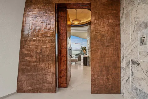 a table with chairs and a stove