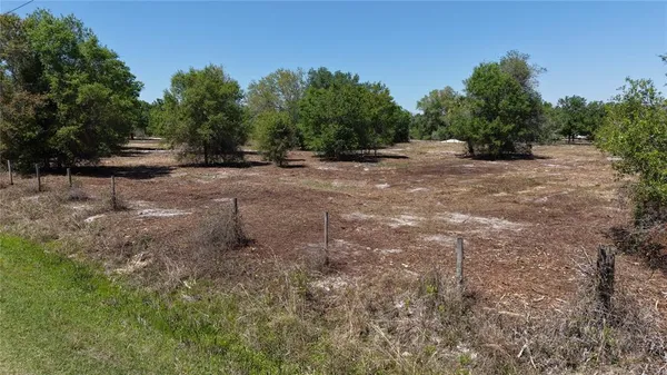 an aerial view of a yard with a yard and plants