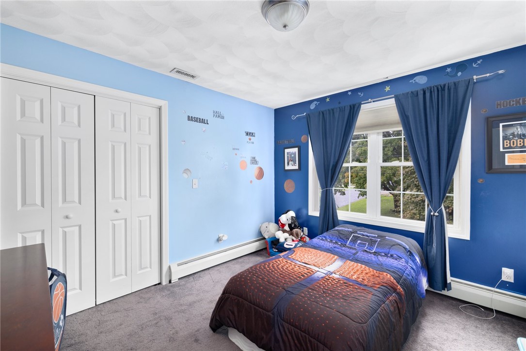 13 Lawrence Road North Providence, RI 02911 - Photo 20 of 31 The third bedroom also offers double windows for natural light.