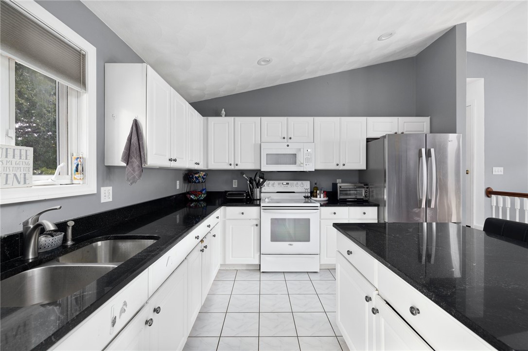 13 Lawrence Road North Providence, RI 02911 - Photo 4 of 31 Granite countertops with plenty of prep space.