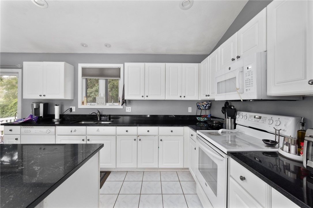 13 Lawrence Road North Providence, RI 02911 - Photo 5 of 31 Neutral in color and fully applianced.