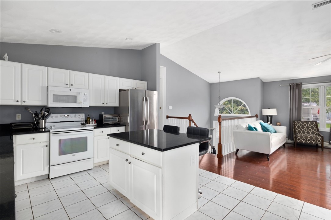 13 Lawrence Road North Providence, RI 02911 - Photo 31 of 31 Cathedral ceilings and an open floorplan are ideal for entertaining.