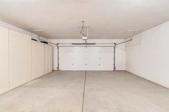 a view of room with a ceiling fan