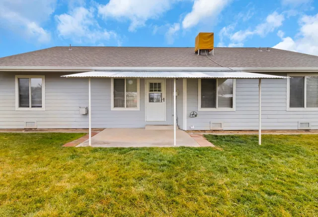 a front view of a house with swimming pool