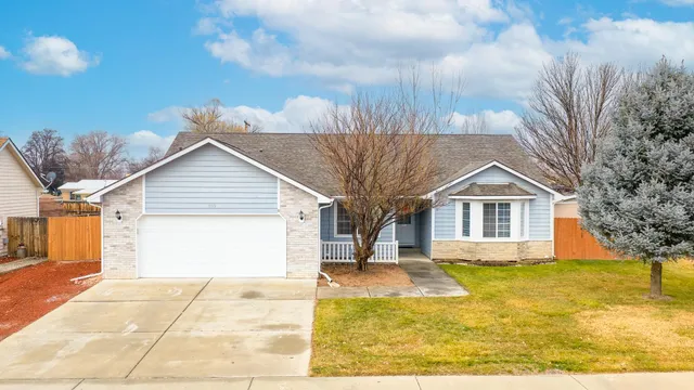 an aerial view of a house with a swimming pool