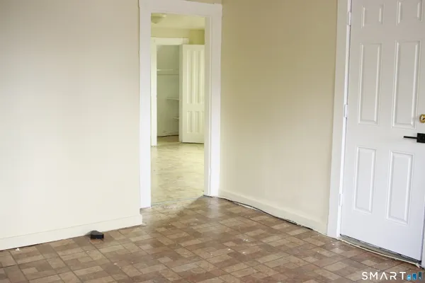 an empty room with a natural light