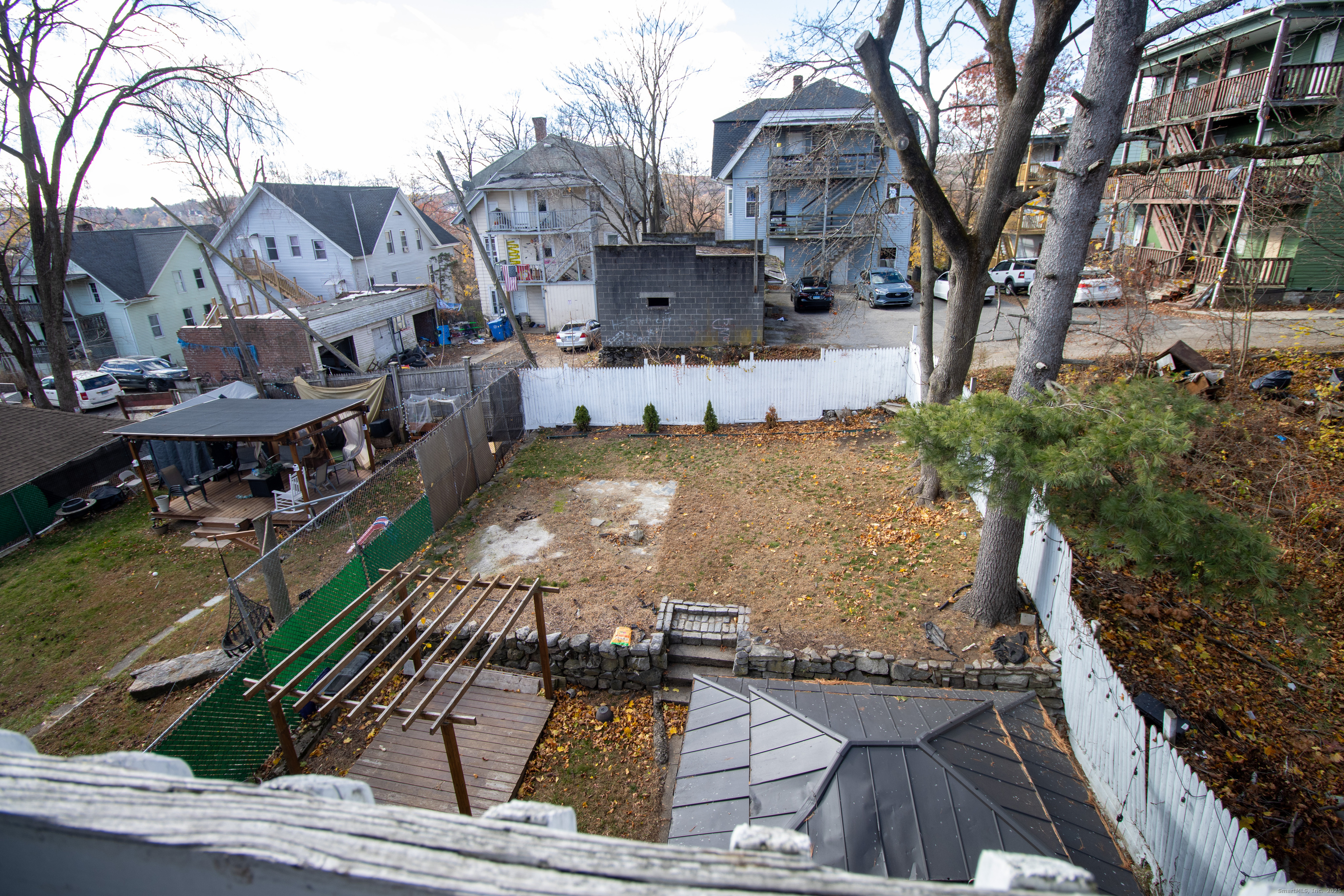 175 Chestnut Avenue Waterbury, CT 06710 - Photo 13 of 15 a view of a house with a yard