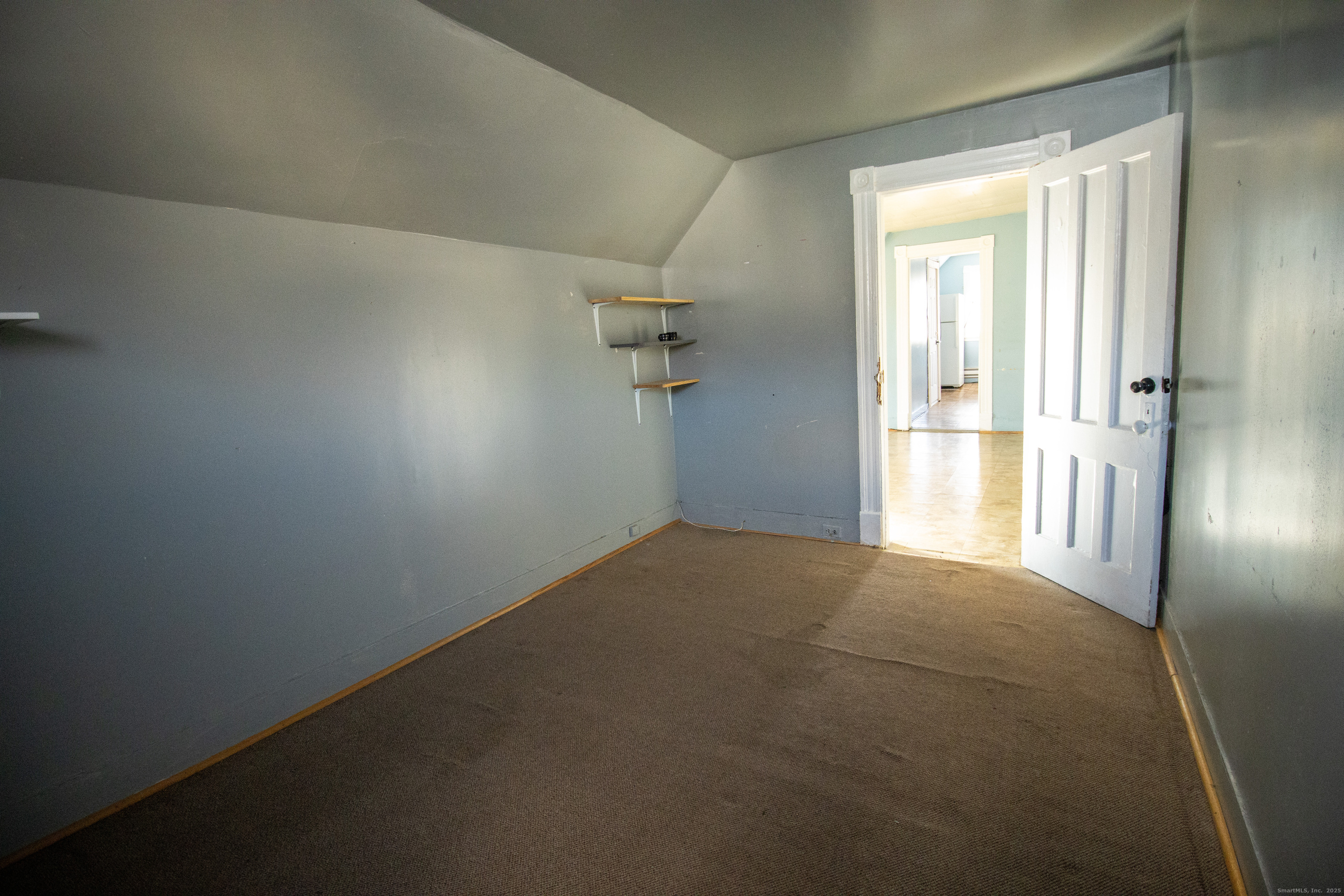 175 Chestnut Avenue Waterbury, CT 06710 - Photo 8 of 15 an empty room with a empty space and windows