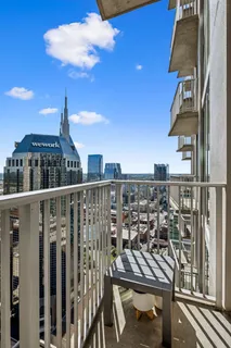 a view of a balcony with city view