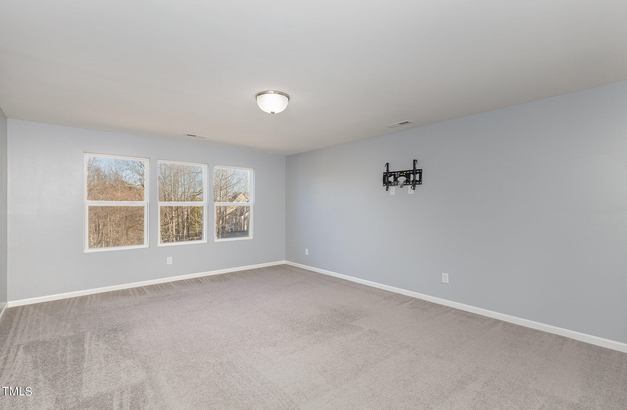500 Hidden Den Path Wendell, NC 27591 - Photo 20 of 36 an empty room with a window