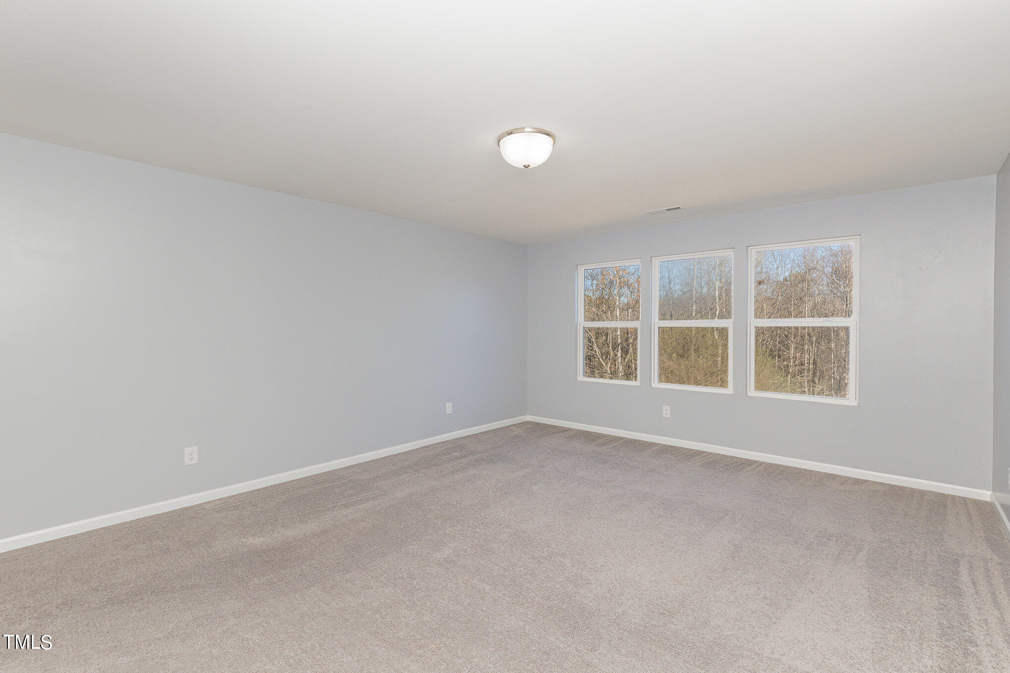 500 Hidden Den Path Wendell, NC 27591 - Photo 21 of 36 an empty room with a window