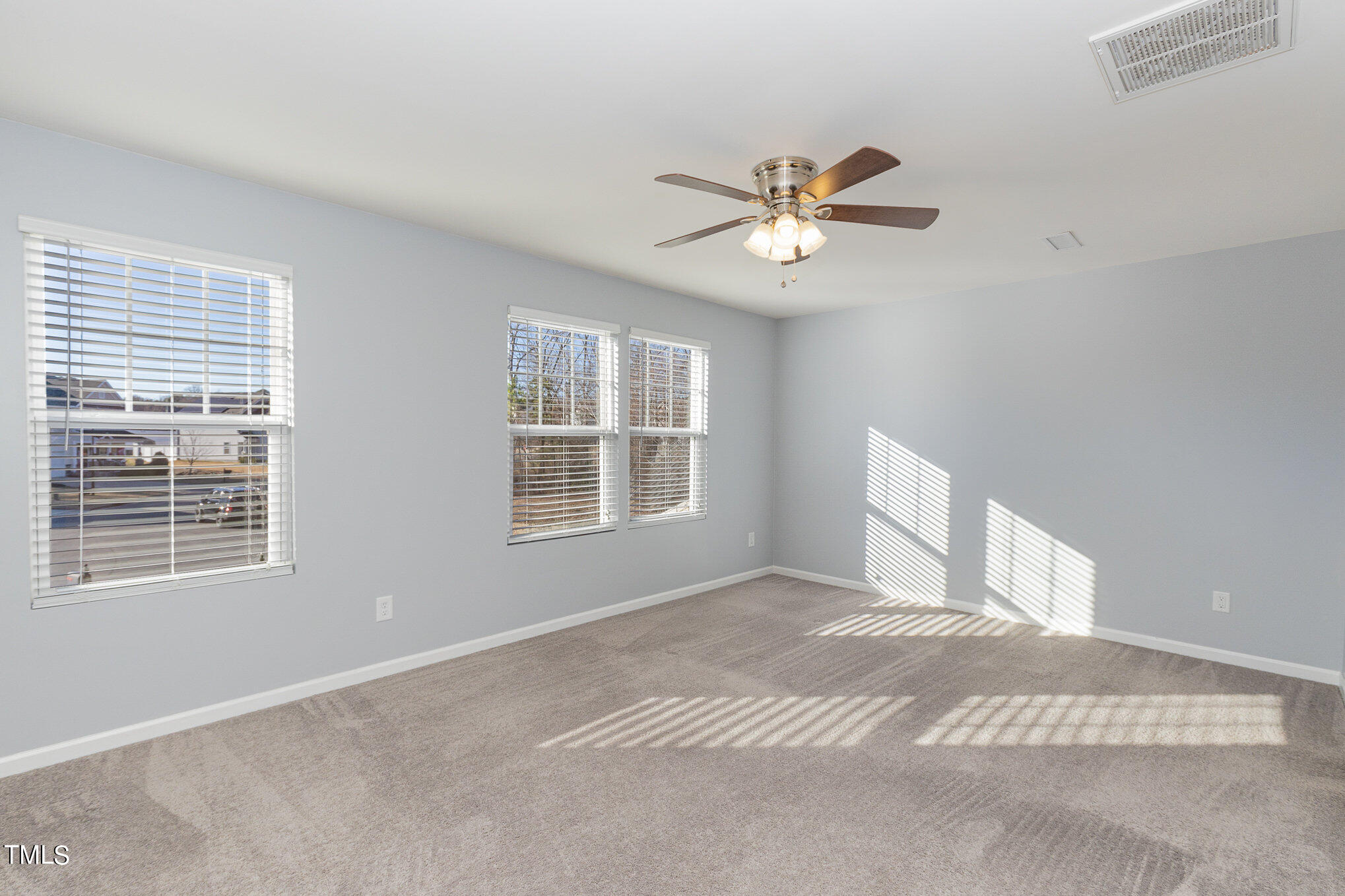 500 Hidden Den Path Wendell, NC 27591 - Photo 22 of 36 a view of an empty room with a window