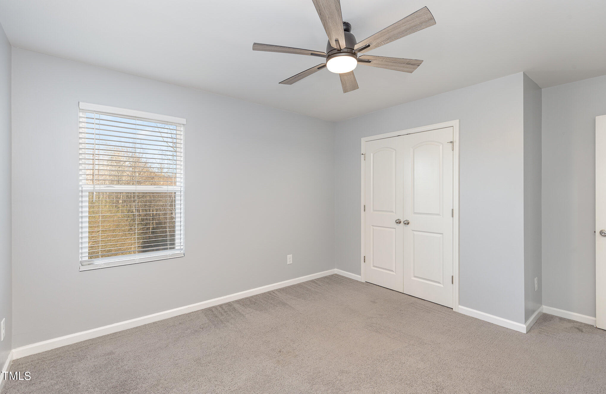 500 Hidden Den Path Wendell, NC 27591 - Photo 29 of 36 a view of an empty room with a window