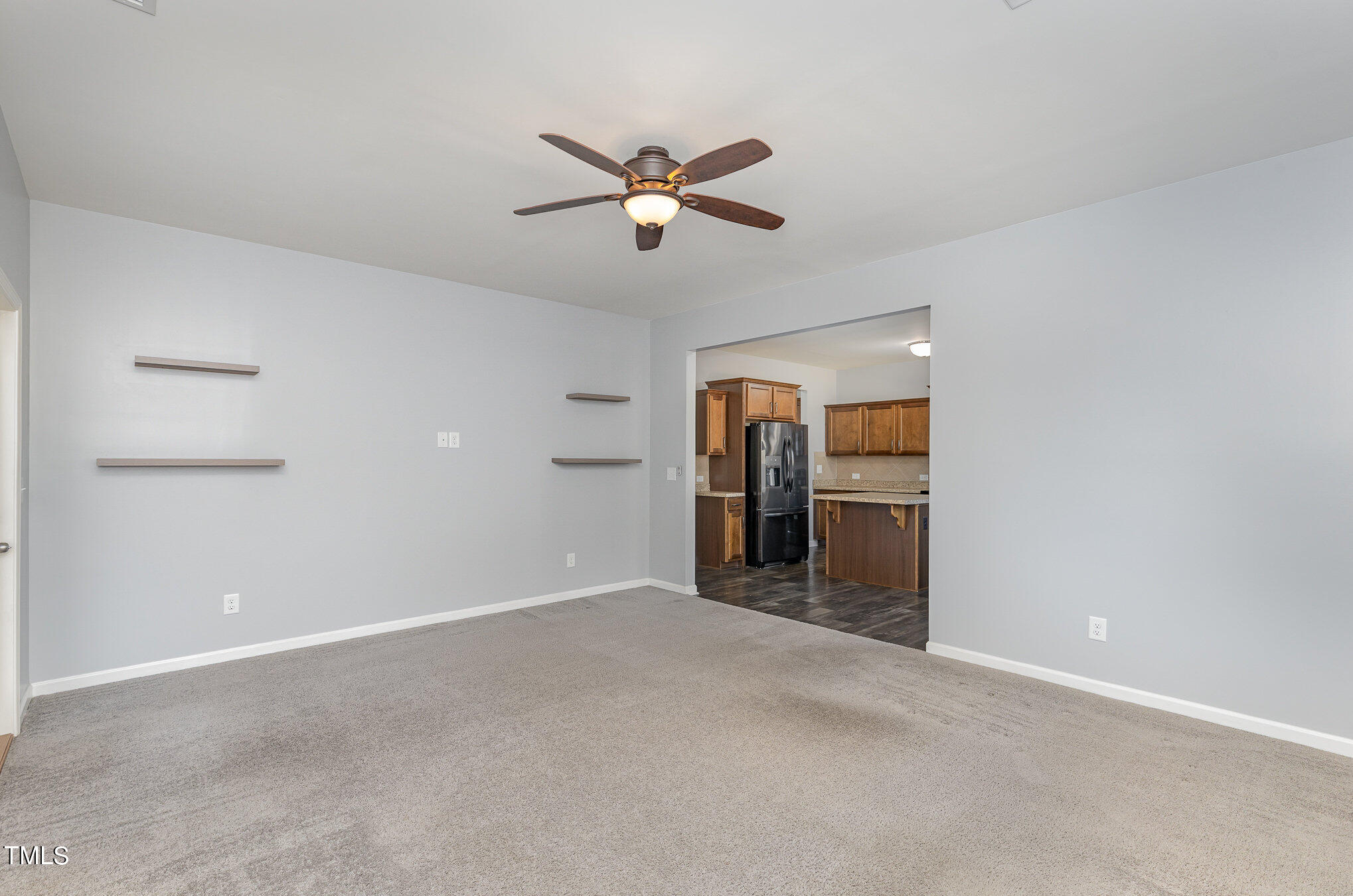 500 Hidden Den Path Wendell, NC 27591 - Photo 6 of 36 a view of empty room with ceiling fan