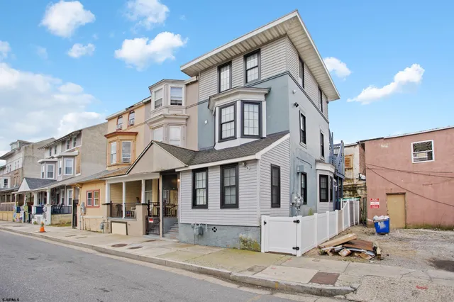 a front view of a large white building