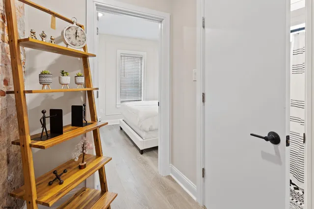 a view of living room and wooden floor